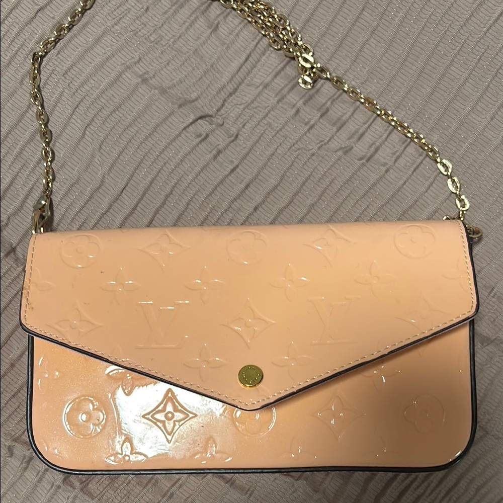 Louis Vuitton Cream Clutch with Gold Accents